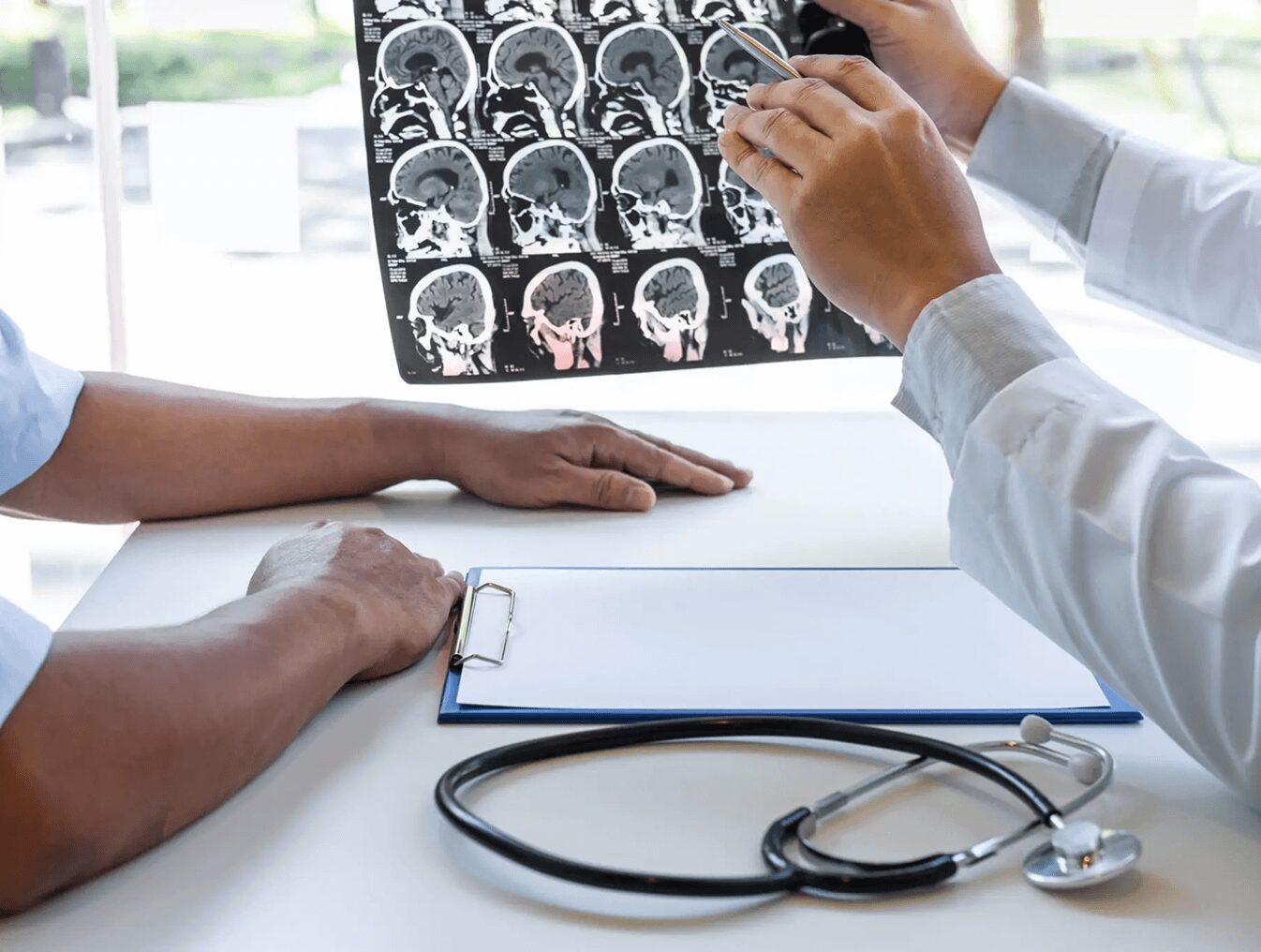 Medical professionals reviewing MRI results